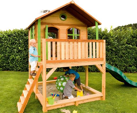 Cabane enfant sur pilotis avec toboggan et bac à sable marc