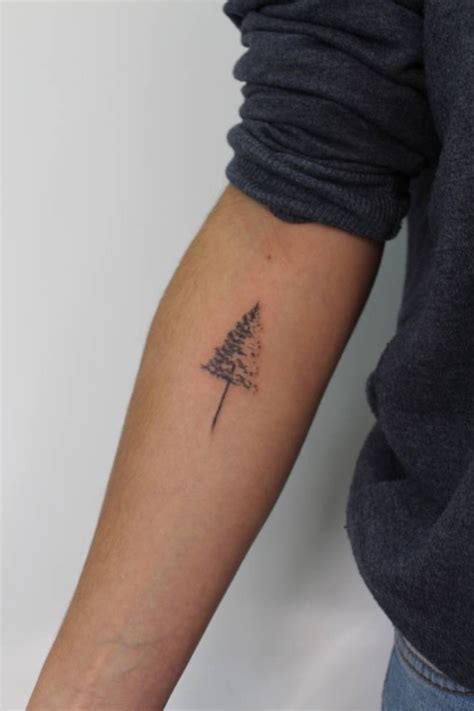 Christmas Tree Tattoo On The Forearm Tattoogrid Net