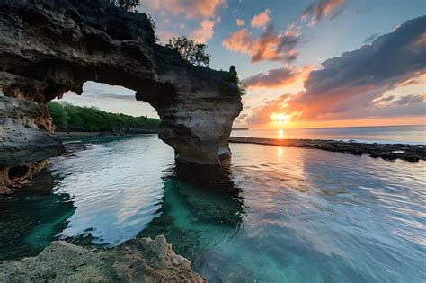 Premium AI Image | Sunset at the beach of the island of Bali Indonesia