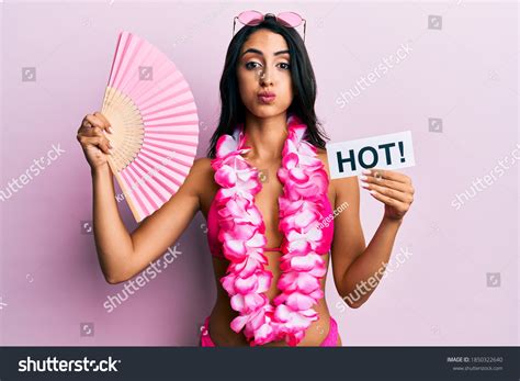 Beautiful Hispanic Woman Wearing Bikini Handfan Stock Photo
