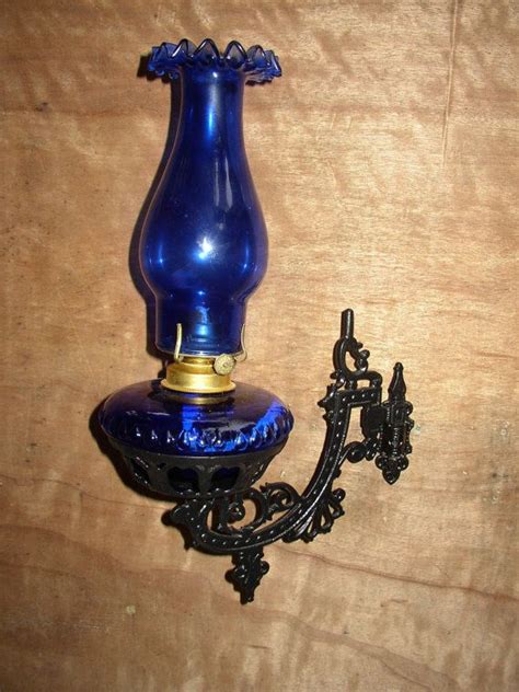 Beautiful Cobalt Blue Oil Lamp With A Cast Iron Wall Mount Swivel