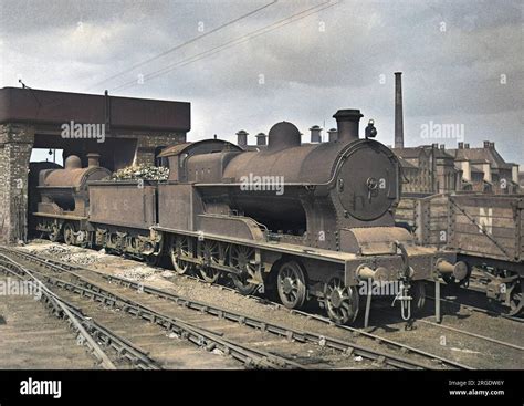 An LMS London Midland And Scottish Steam Engine On A Railway Track