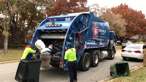 Republic Services Rear Loader Garbage Truck On Manual Trash And Leaves