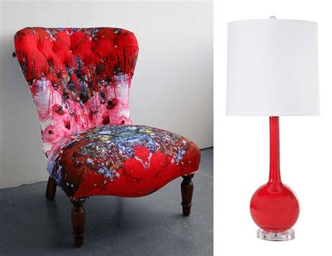 A Red Chair Next To A White Lamp