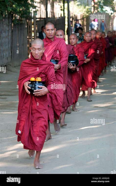 Buddhist Monks Collecting Alms Near Mandalay Burma Myanmar Stock