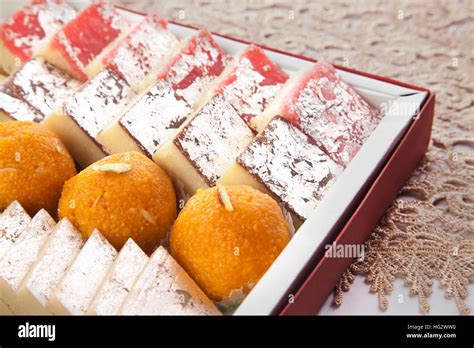 ladoo , chocolate barfi, kaju barfi , indian sweets Stock Photo - Alamy