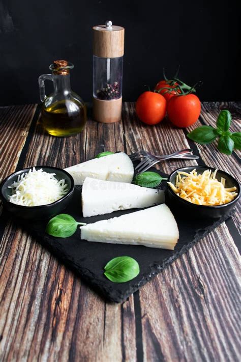 Different Types of Cheese. Italian Cuisine. Wooden Background Stock ...