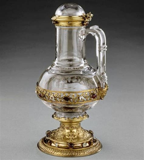 An Ornate Glass Vase With Gold Trimming