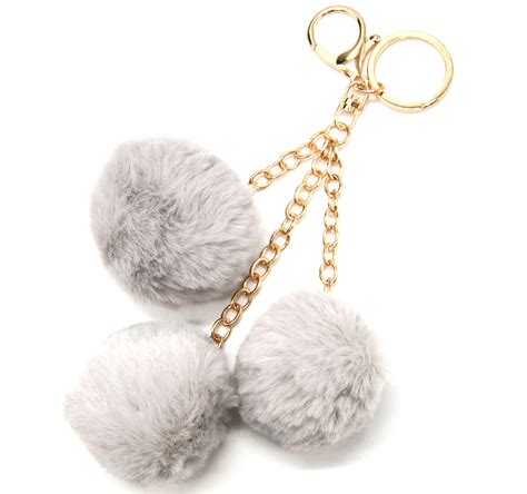 PT1715E Porte Clés Bijou de Sac Triple Pompons Fourrure Gris et