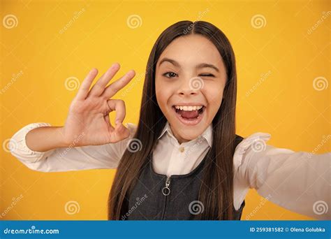 Fashion Teen Girl In Trendy Wear Making Selfie Posing On Yellow Background Fashion Teenager