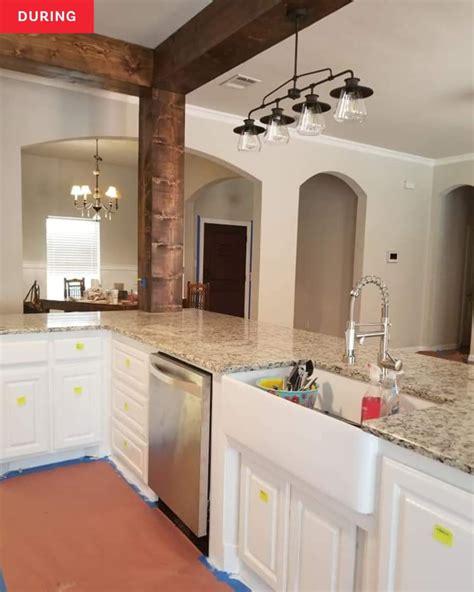 Open Kitchen With Wooden Support Beams