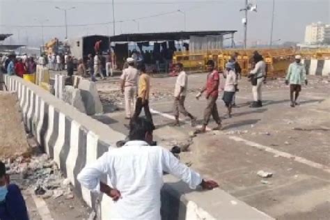 Police Delhi Police Removing Barricades At Tikri Ghazipur Borders