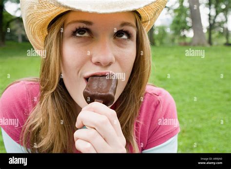 Teenage Girl Eating Ice Cream Stock Photo Alamy