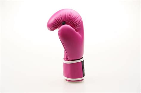 Premium Photo | Single pink boxing glove isolated on a white background