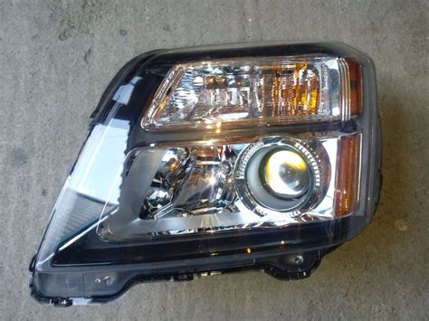 Faro Gmc Terrain Izquierdo Semi Original En Mercado Libre