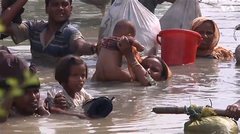 Rohingya Refugees Cross River To Reach Bangladesh Voanews Youtube