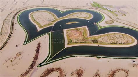 Heart Shape Love Lake In Dubai Desert In Al Qudra Area Aerial View