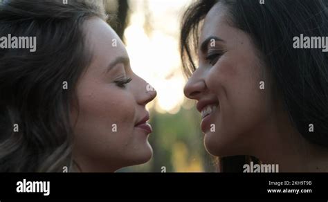 Two Girls French Kissing Outside At The Park LGBT Lesbian Couple Kiss Stock Video Footage Alamy
