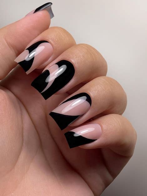 Premium Photo Women S Hands With A Black Fashionable Manicure Close