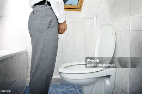 Man Urinating Standing Up Stock Photo - Download Image Now - Urinating