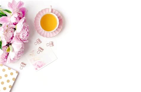 Premium Photo Styled Flatlay With Pink Peonies Notebook And Tea Cup