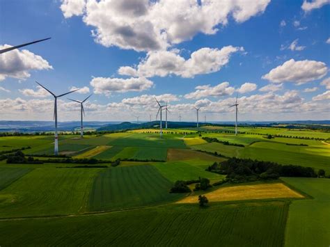 Premium Photo Aerial View Of The Cloudy Sky Over The Green