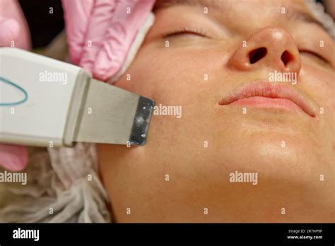 Close Up Ultrasonic Face Cleaning Modern Equipment Beautician Does