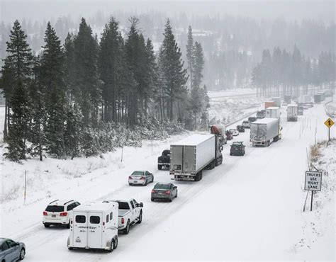 Eastbound traffic crawls over Donner Summit on the Interstate 80 near ...