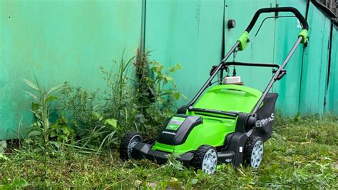 Изменяемый дорожный просвет! Как косит косилка от GreenWorks? Модель ...