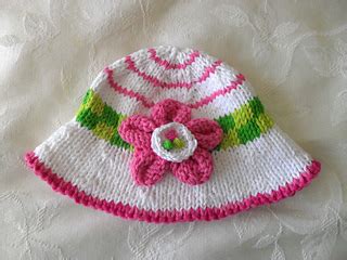 Ravelry Knitted Brimmed Baby Hat With Flower Pattern By Susan Gardner