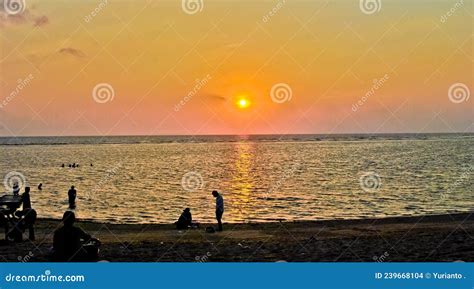 Silhouettes of Tourist at Famous Sunset Beach in Kuta, Bali, Indonesia Editorial Stock Image ...