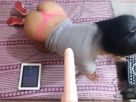 Hot Latina Teases With Dildo