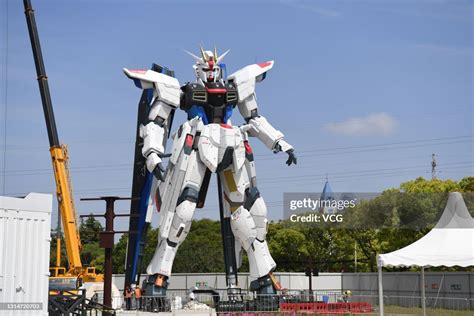 A 1803 Meter High Freedom Gundam Statue Is On Display At The Mitsui