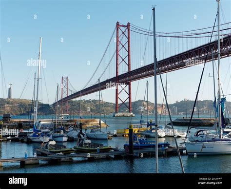 The Ponte 25 De Abril 25th Of April Bridge Spanning The River Tagus