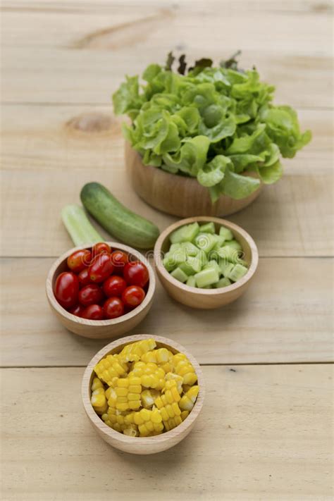 Fresh Vegetable In Vintage Wooden Frame On Dark Wooden Floor Stock