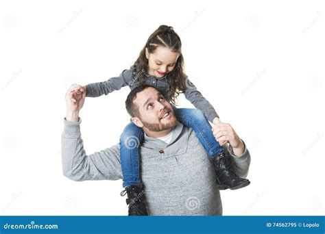 Father Carrying Daughter On His Shoulders Studio Shot Stock Image