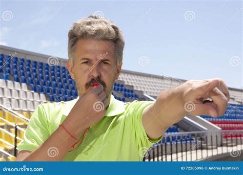 Angry Football Referee Blowing A Whistle Stock Photo Image Of Pose