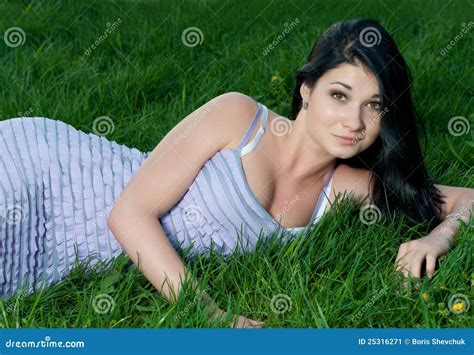 Beautiful Brunette Girl Lying In Grass Stock Image Image Of Field Beautiful