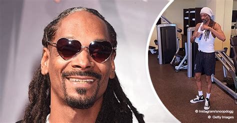 Snoop Dogg Shows Off His Muscles Posing In A Gym Wearing A White T