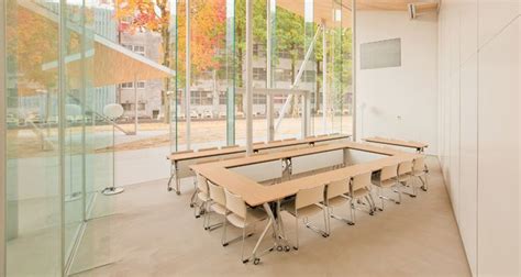 Sanaa Places Junko Fukutake Hall Beneath Angled Steel Roof Canopies