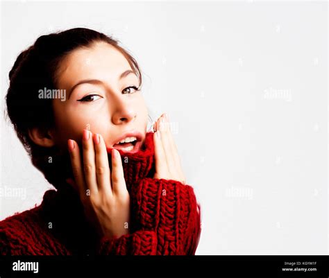 Young Pretty Woman In Sweater And Scarf All Over Her Face Lifes Stock