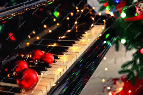 Premium Photo Piano Keyboard With Christmas Decoration Closeup