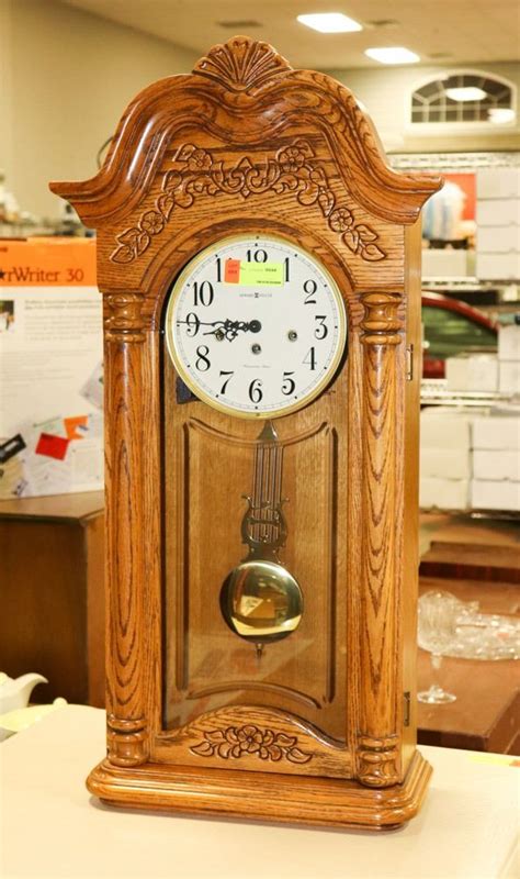 Solid Oak Howard Miller Pendulum Wall Clock