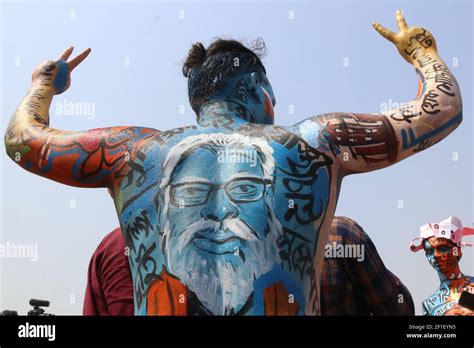 Bharatiya Janata Party BJP Supporter Shows His Body Painted During A