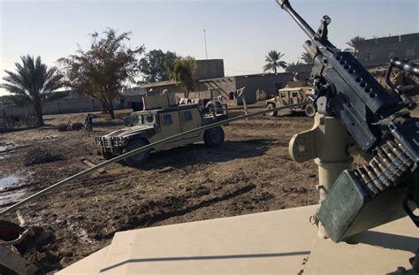 A U S Army Convoy Of High Mobility Multipurpose Wheeled Vehicles