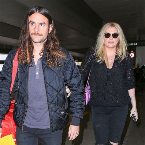 KESHA and Her Boyfriend Brad Ashenfelter at LAX Airport 12/21/2016 ...