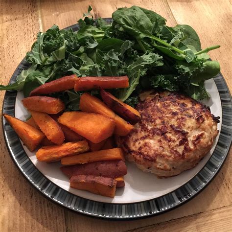 Lean Turkey Burger With Sweet Potato Wedges With Uncooked Spinach And