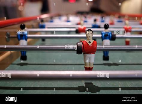 Figurine Of An Extra Long Foosball Table Or Table Football Stock Photo