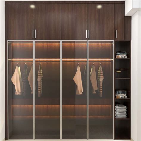 Compact Sliding Door Wardrobe Design With And Loft Livspace