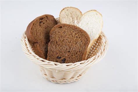 Two Varieties of Black and White Bread in a Basket Stock Image - Image ...